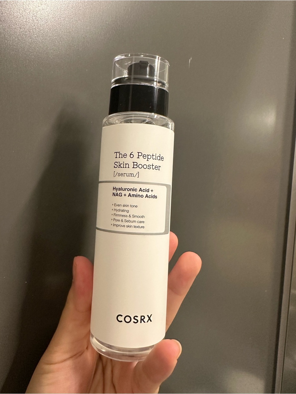 COS White & Black Peptide Skin Booster Serum Bottle